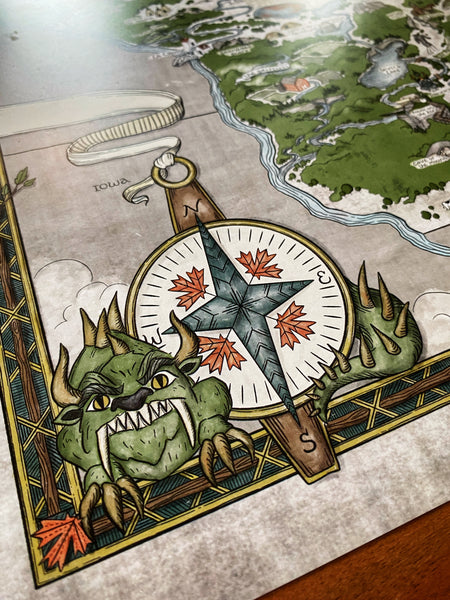 A close-up view of the map's compass rose and a fierce hodag!