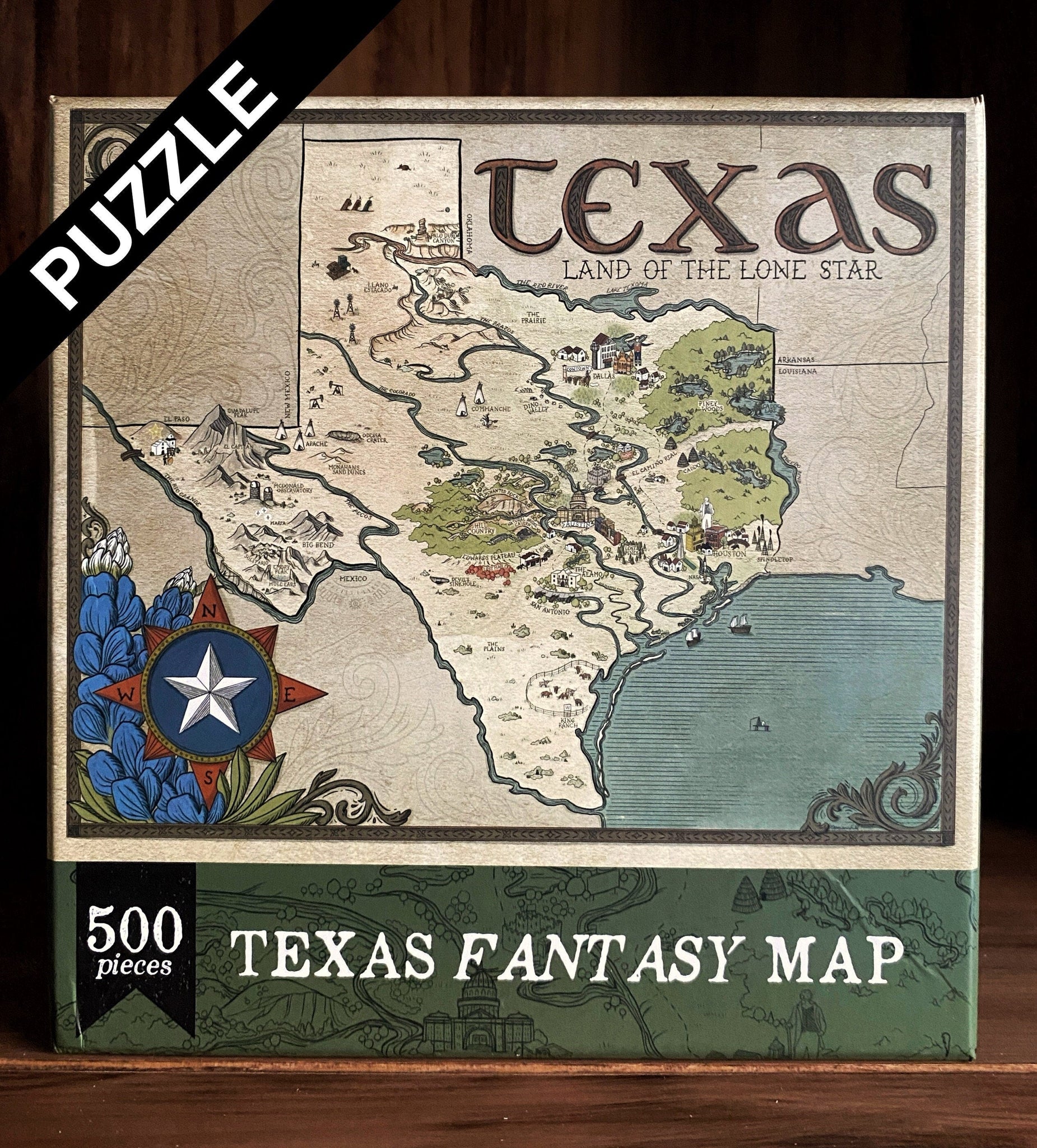 Image shows a 500 piece puzzle with a hand-drawn fantasy-style map of Texas