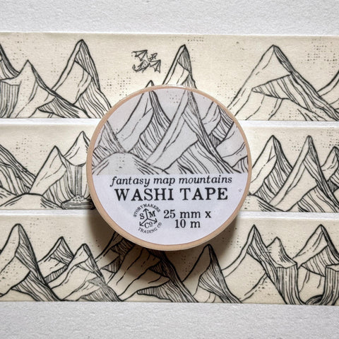 Image of washi tape with hand drawn mountains in a fantasy map style.