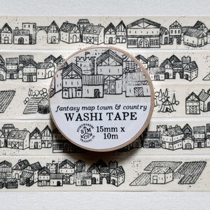 Washi tape with detailed drawings of houses and farms and more in a fantasy map style.