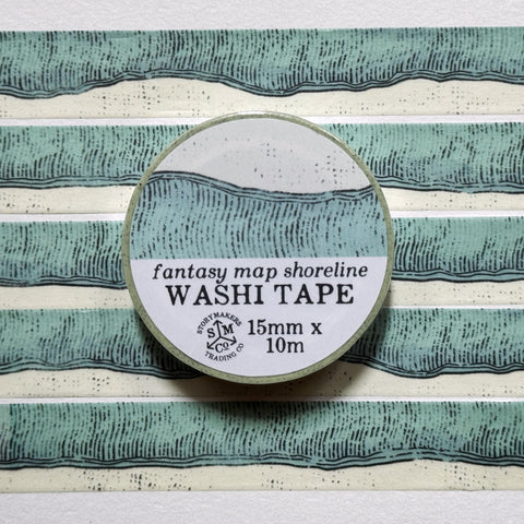 Washi tape with hand-drawn shoreline and water in a fantasy map style.