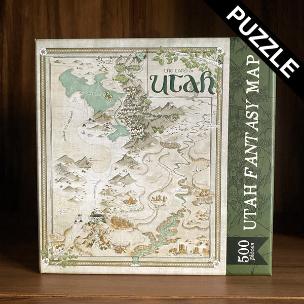 Image shows a 500 piece puzzle with a hand-drawn fantasy-style map of Utah